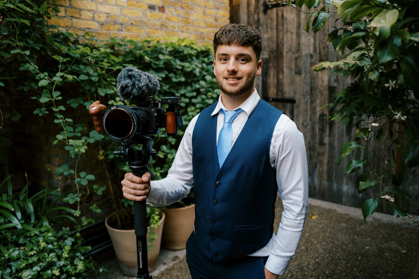 James Steer - natural wedding videographer based in Leigh-on-Sea, Essex, holding his camera